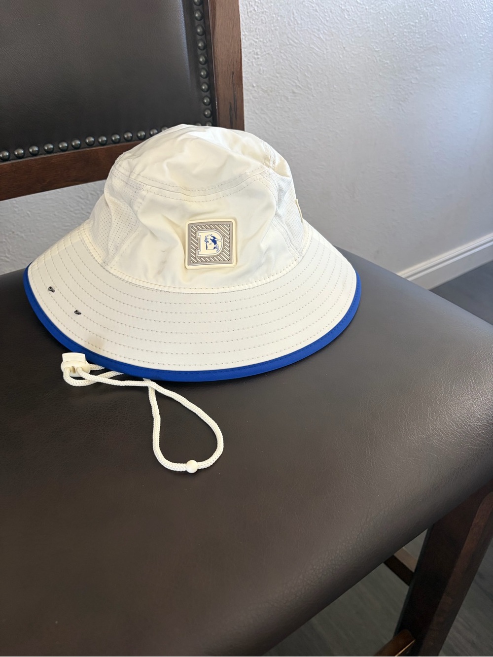 New Era Broncos White Bucket Hat with Blue Trim and Logo Patch